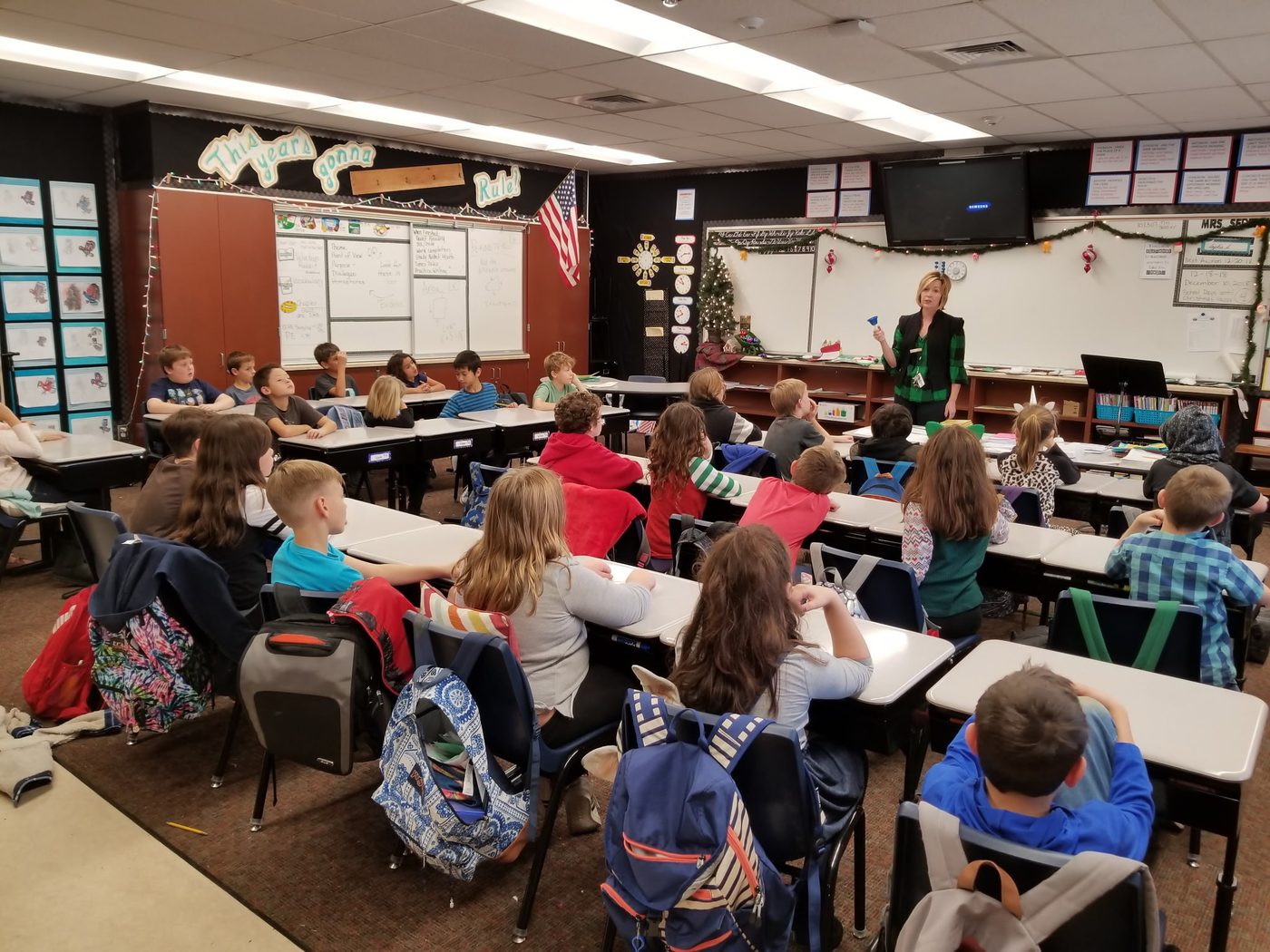 Students at their desks in a decorated classroom