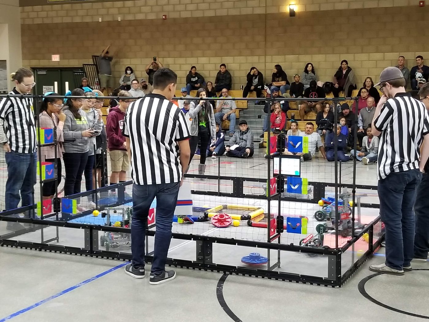 Students competing in a robotics competition